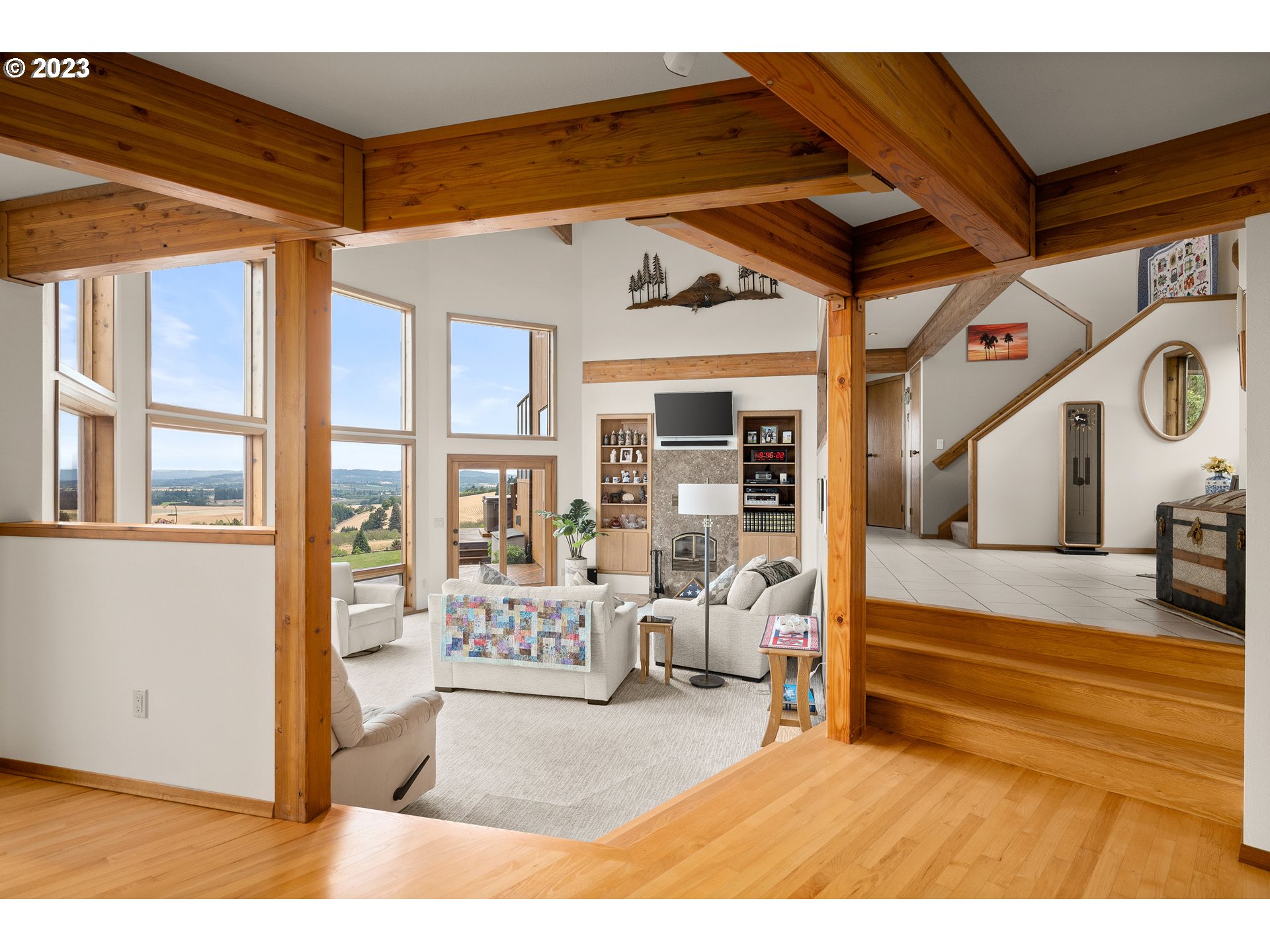 30875 Southwest Laurelview Road Hillsboro, OR 97123 - Photo 9 of 36 a view of a livingroom with furniture and a ceiling fan
