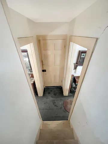 a view of a livingroom with a staircase