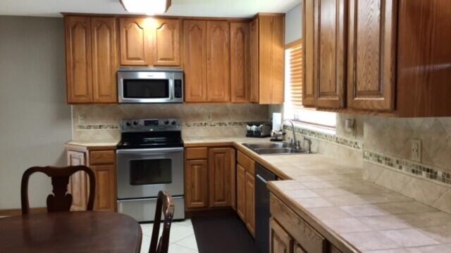 11745 Inverness Circle Wellington, FL 33414 - Photo 6 of 11 kitchen 2