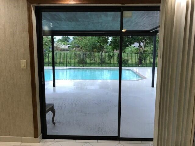 11745 Inverness Circle Wellington, FL 33414 - Photo 7 of 11 pool view