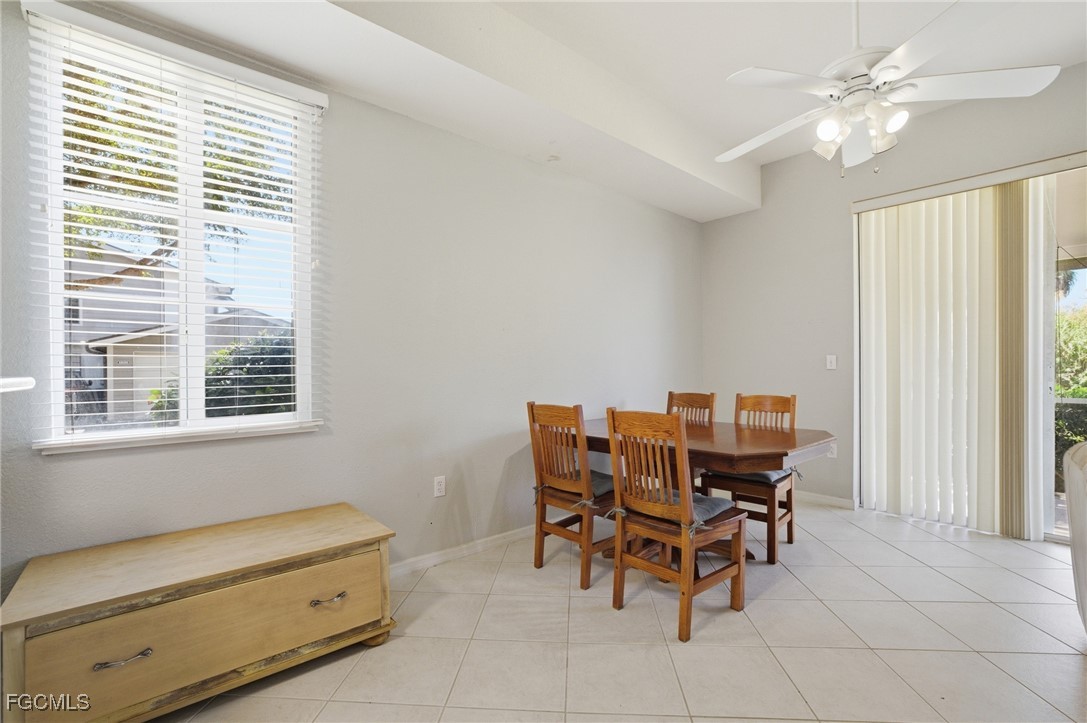 13160 Broadhurst Loop, Unit 101 Fort Myers, FL 33919 - Photo 13 of 39 a view of a workspace with furniture and a window