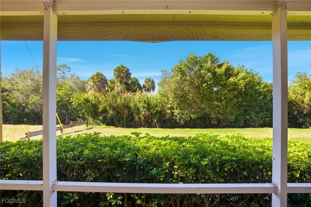 13160 Broadhurst Loop, Unit 101 Fort Myers, FL 33919 - Photo 32 of 39 a view of a yard with a small space