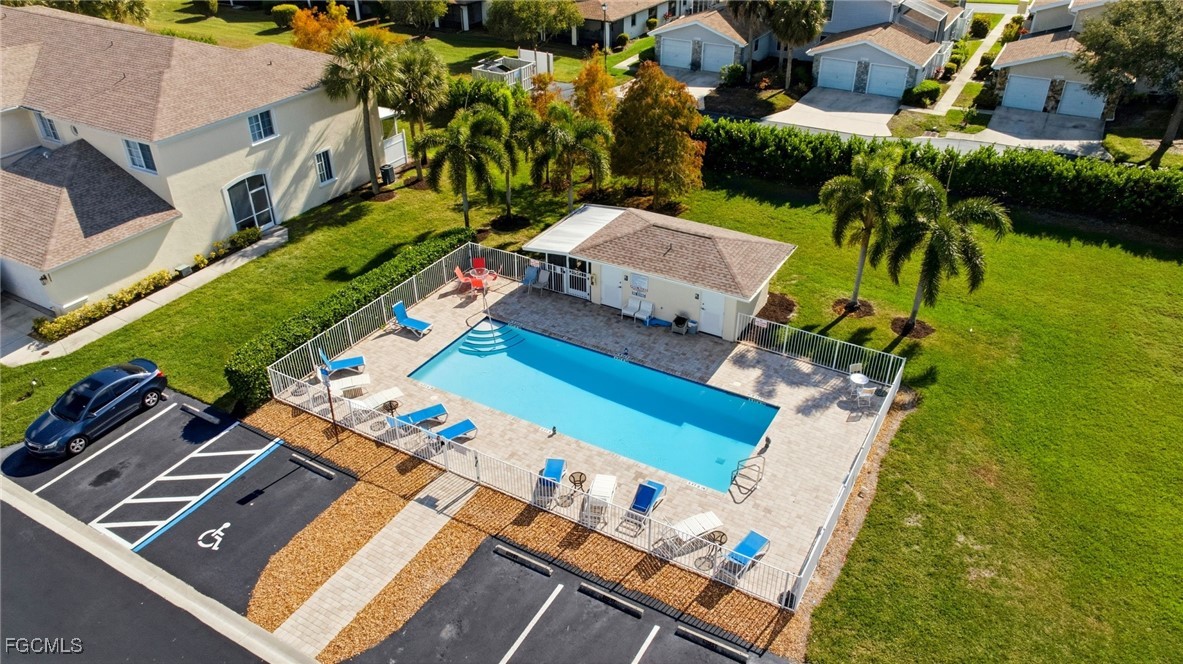 13160 Broadhurst Loop, Unit 101 Fort Myers, FL 33919 - Photo 33 of 39 an aerial view of a house with a garden