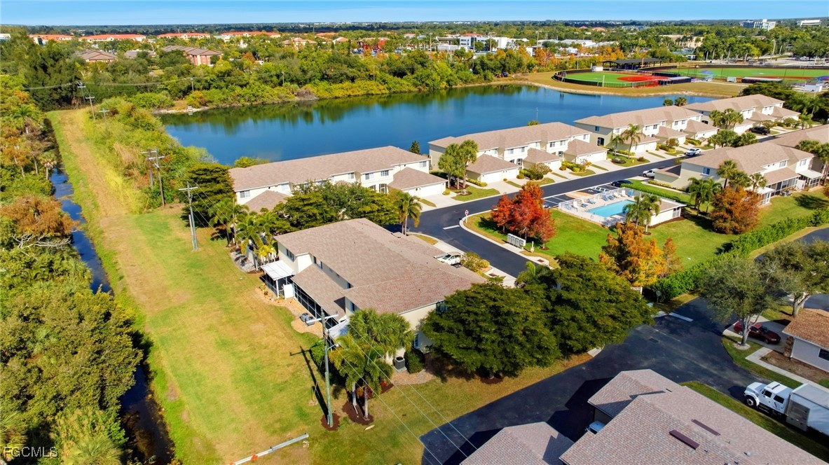 13160 Broadhurst Loop, Unit 101 Fort Myers, FL 33919 - Photo 37 of 39 an aerial view of a residential building with swimming pool