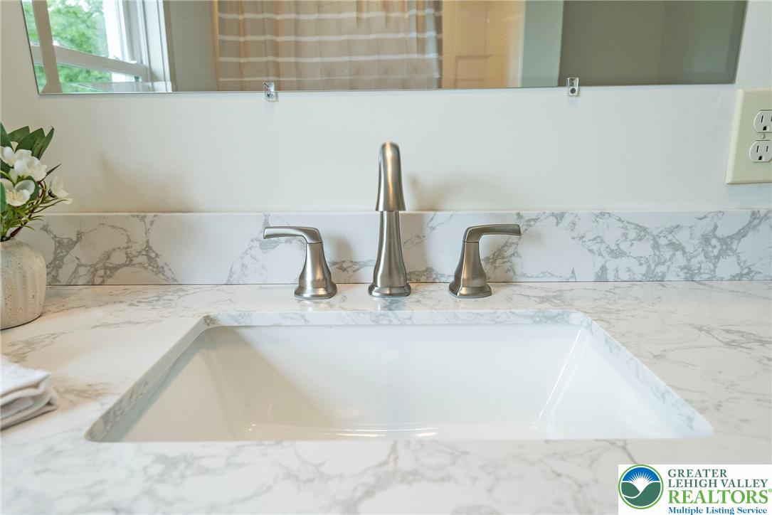 72 Allegheny Road Mount Bethel, PA 18343 - Photo 39 of 72 Premium brushed nickel fixtures accent a pristine, naturally patterned countertop.