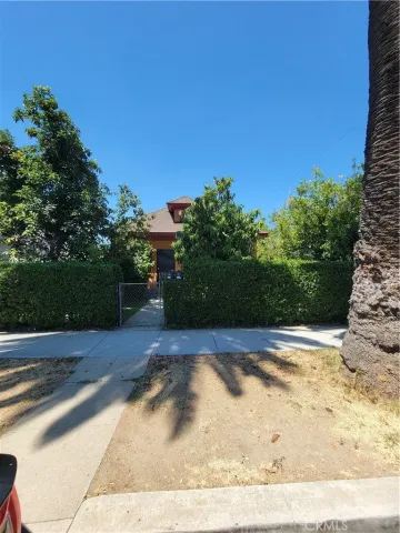 a view of backyard with green space