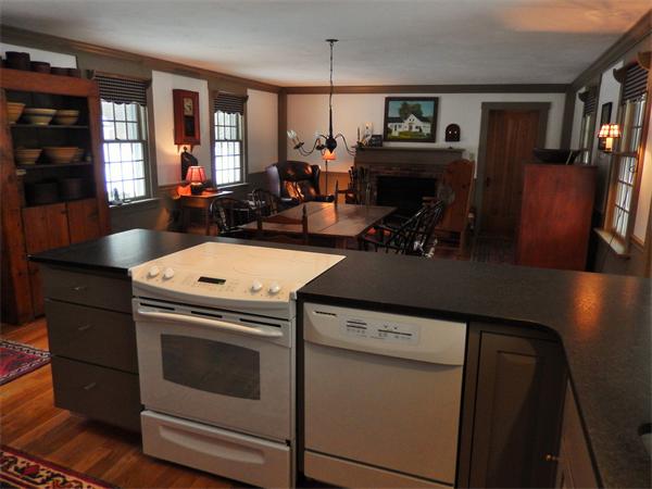 317 Worcester Road Princeton, MA 01541 - Photo 11 of 23 a kitchen with a stove and a refrigerator