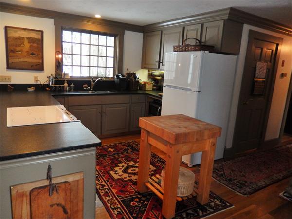 317 Worcester Road Princeton, MA 01541 - Photo 12 of 23 a kitchen with stainless steel appliances a refrigerator and a stove