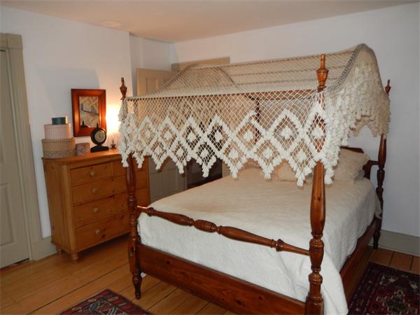 317 Worcester Road Princeton, MA 01541 - Photo 20 of 23 a bedroom with a bed and a dresser