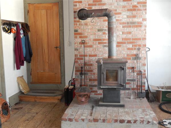 317 Worcester Road Princeton, MA 01541 - Photo 23 of 23 a living room with furniture and a fireplace
