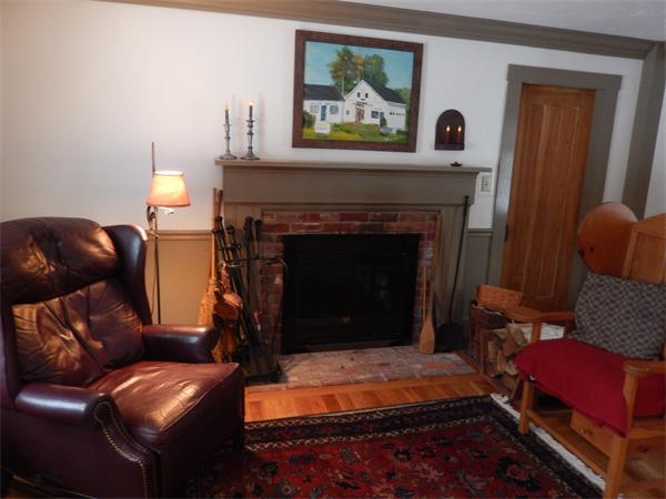 317 Worcester Road Princeton, MA 01541 - Photo 10 of 23 a living room with furniture and a fireplace