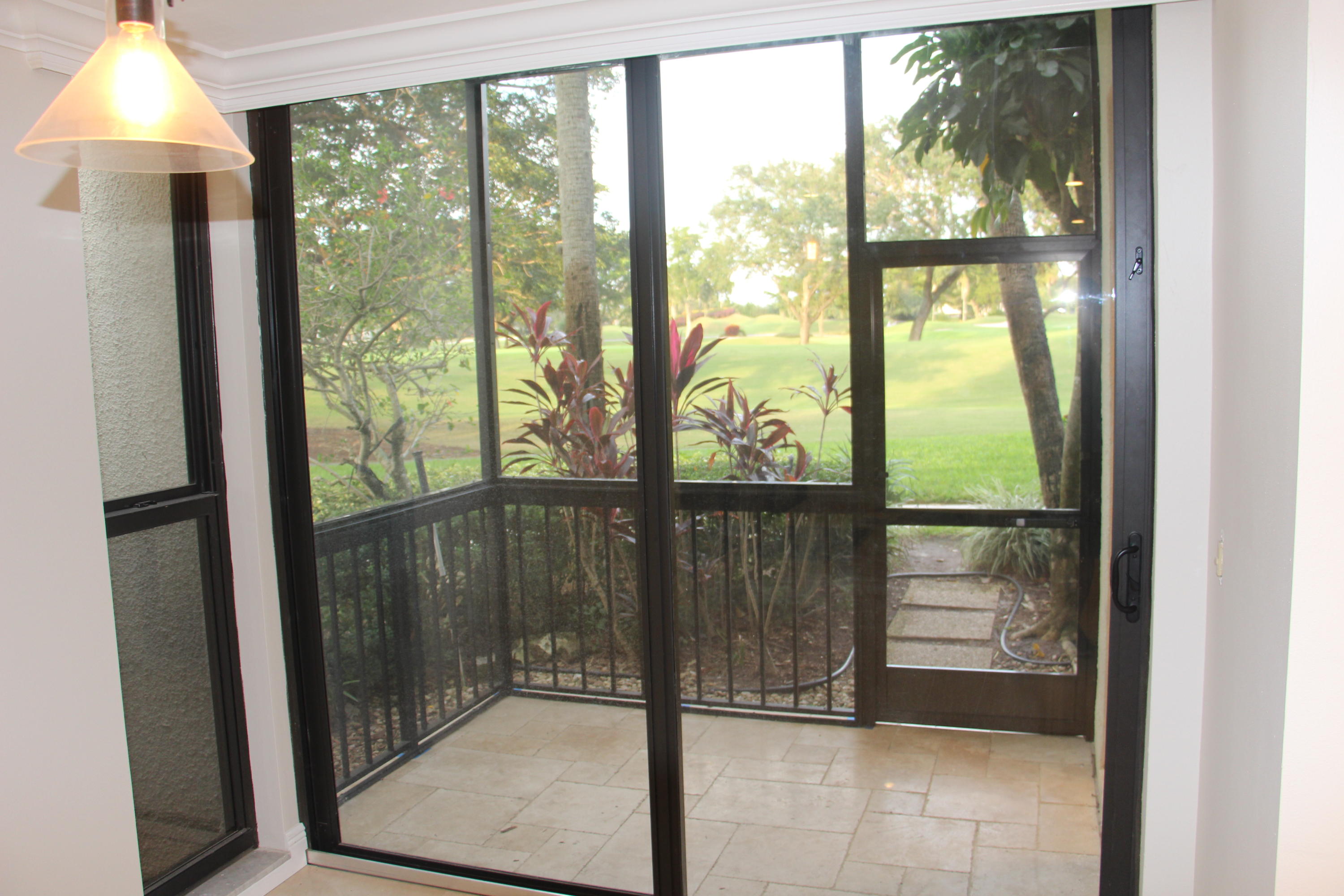 1912 Bridgewood Drive, Unit 1912 Boca Raton, FL 33434 - Photo 21 of 26 Kitchen Patio