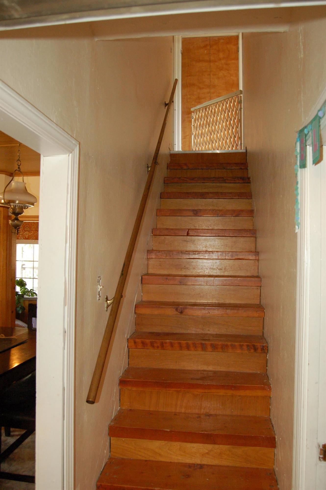 2180 Dick George Road Cave Junction, OR 97523 - Photo 29 of 34 Stairs leading up to the 2nd level of ho
