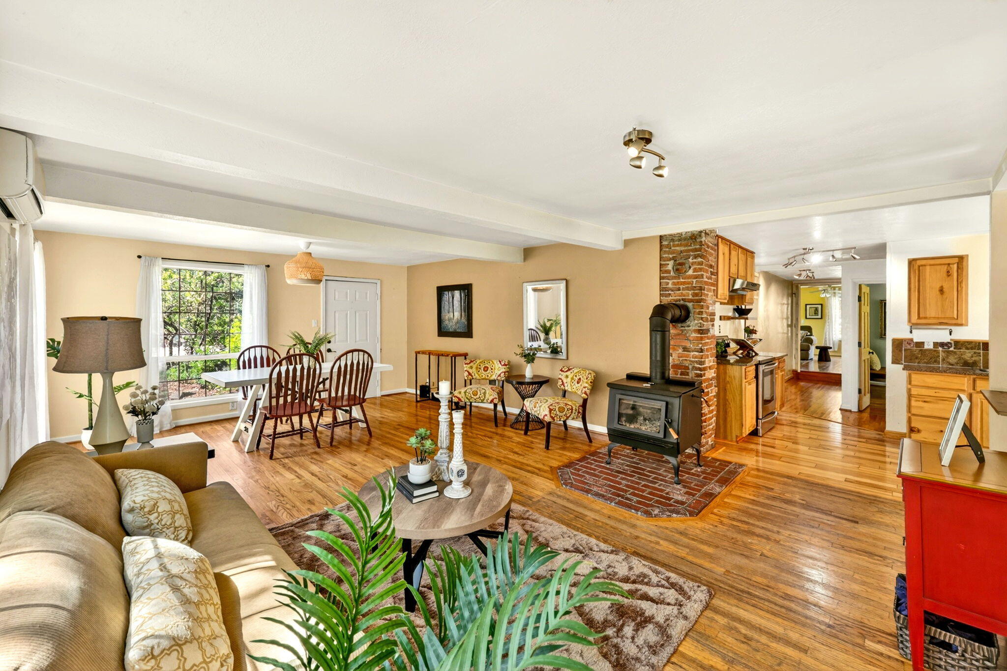51 Sterling Creek Road Jacksonville, OR 97530 - Photo 9 of 54 a living room with lots of furniture and wooden floor