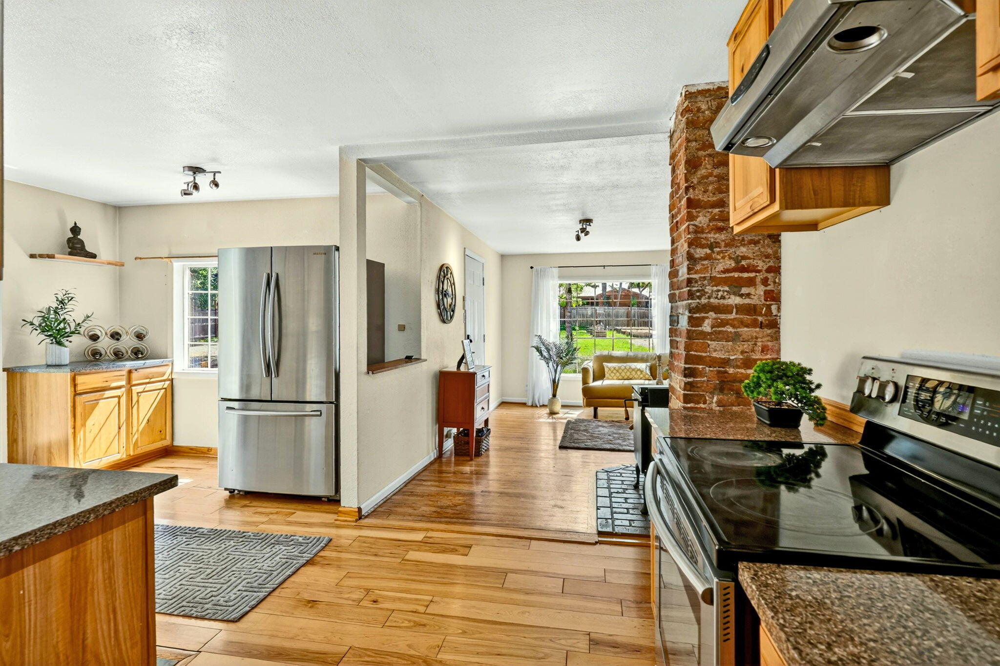 51 Sterling Creek Road Jacksonville, OR 97530 - Photo 13 of 54 a kitchen with stainless steel appliances granite countertop a refrigerator and a stove