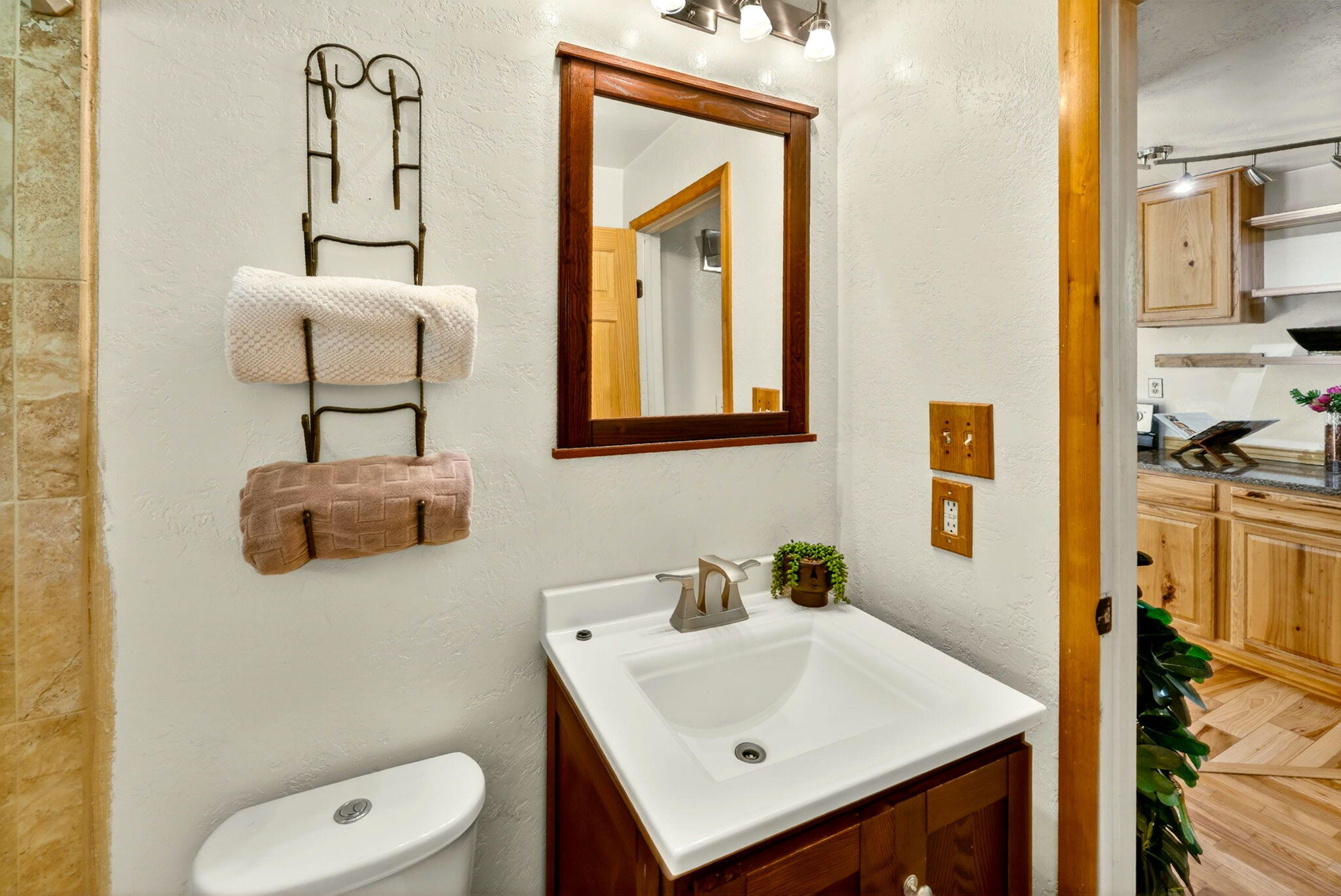 51 Sterling Creek Road Jacksonville, OR 97530 - Photo 27 of 54 a bathroom with a toilet sink and mirror
