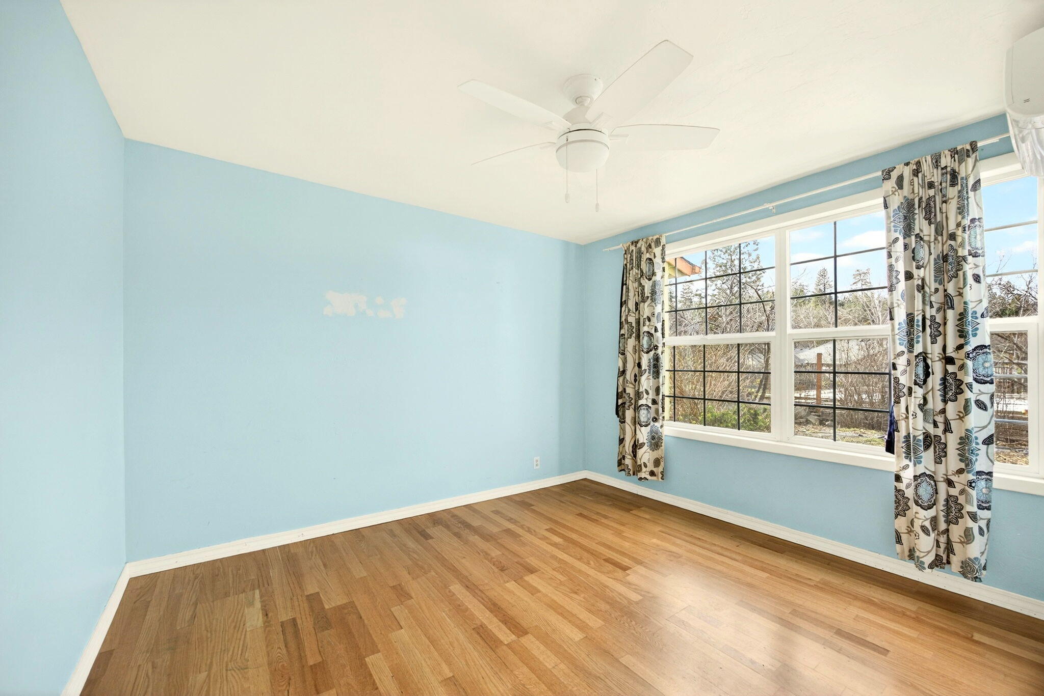 51 Sterling Creek Road Jacksonville, OR 97530 - Photo 29 of 54 a view of an empty room with a window