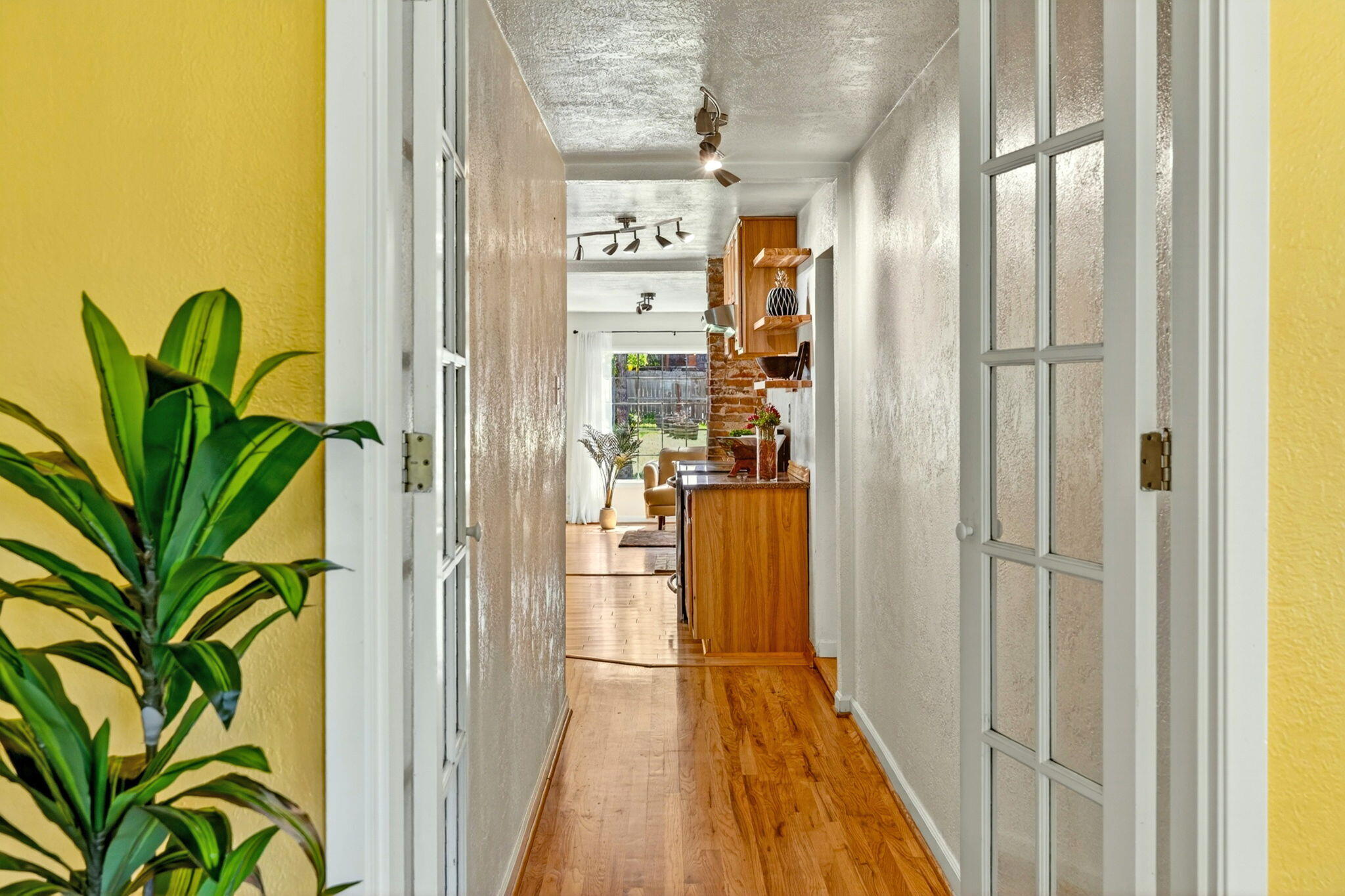 51 Sterling Creek Road Jacksonville, OR 97530 - Photo 33 of 54 a view of a hallway with wooden floor and a dining room