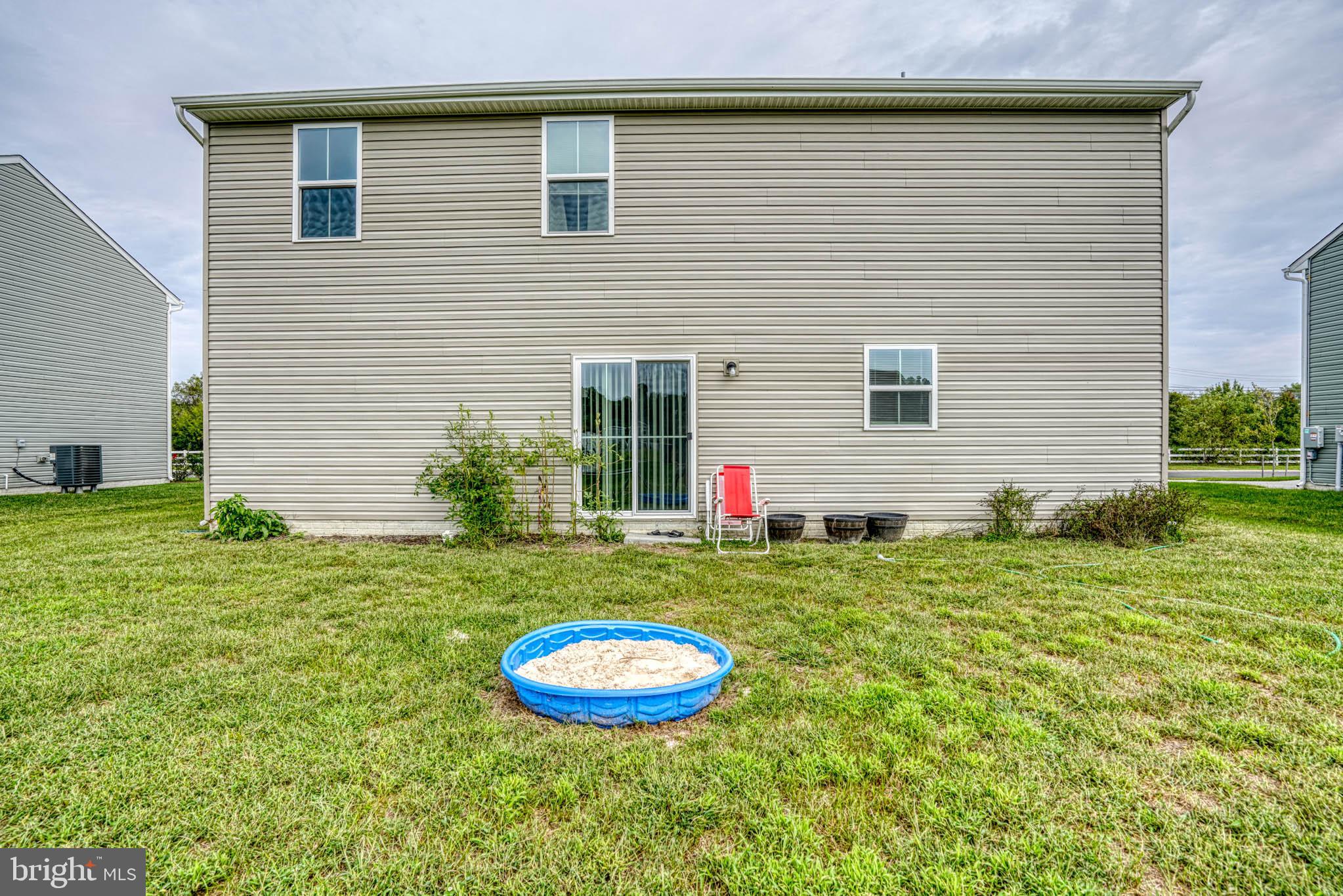 11 Saddle Bill Circle Cambridge, MD 21613 - Photo 29 of 31 a view of a house with a backyard