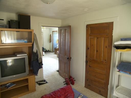 3263 East 8th Road Utica, IL 61373 - Photo 4 of 9 a living room with furniture and a flat screen tv