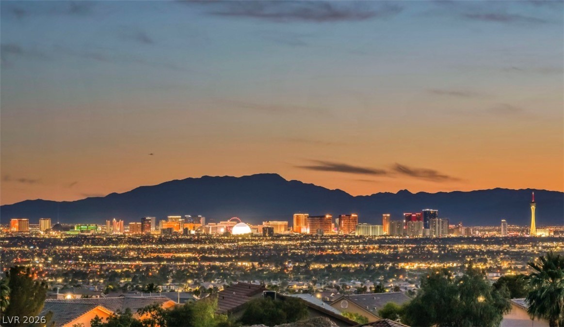 2269 Exeter Drive Las Vegas, NV 89156 - Photo 21 of 30 Capture the breathtaking allure of city lights and distant mountains from this elevated perspective.