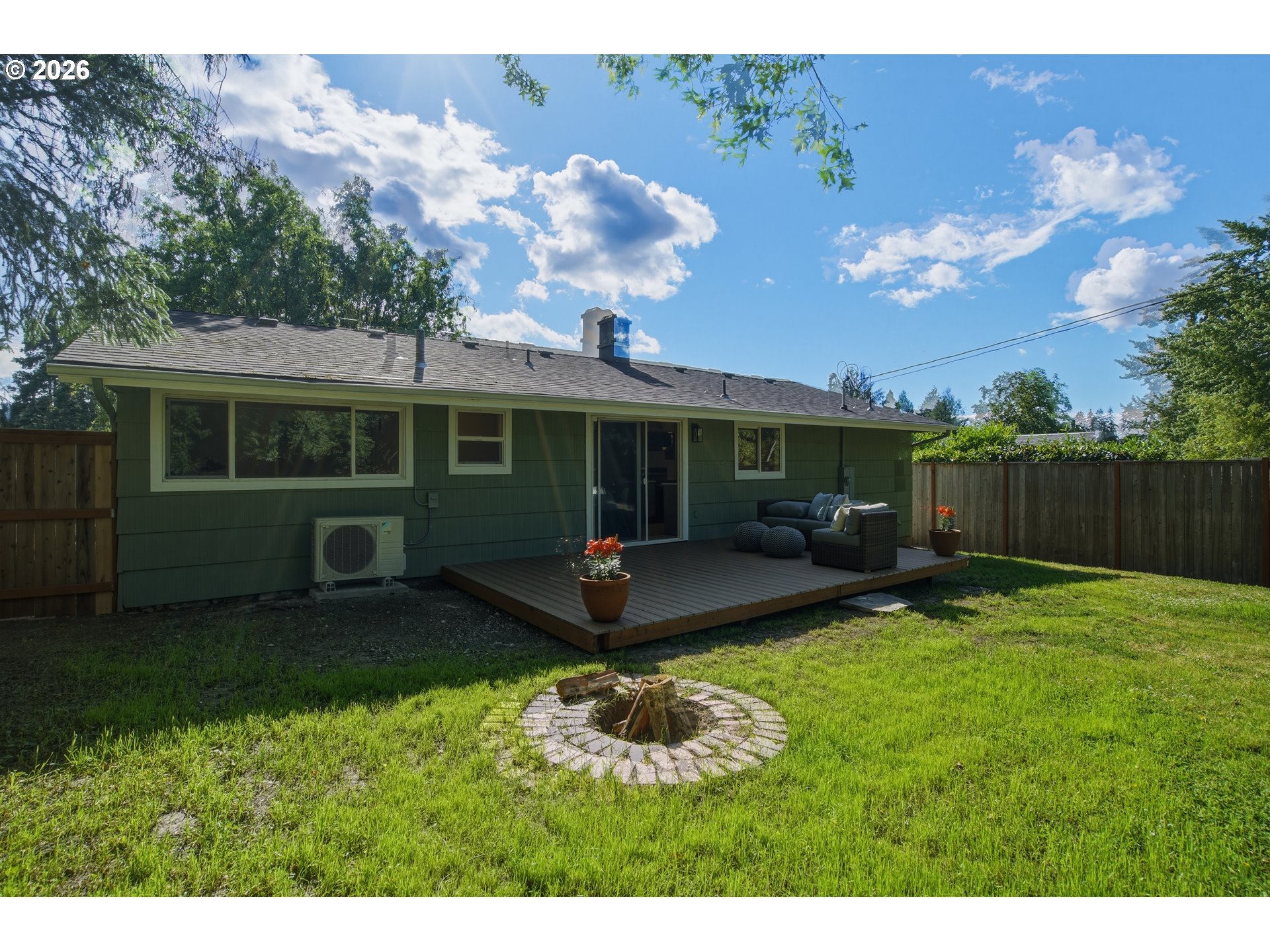 3455 Potter Street Eugene, OR 97405 - Photo 16 of 36 a view of a house with backyard and sitting area