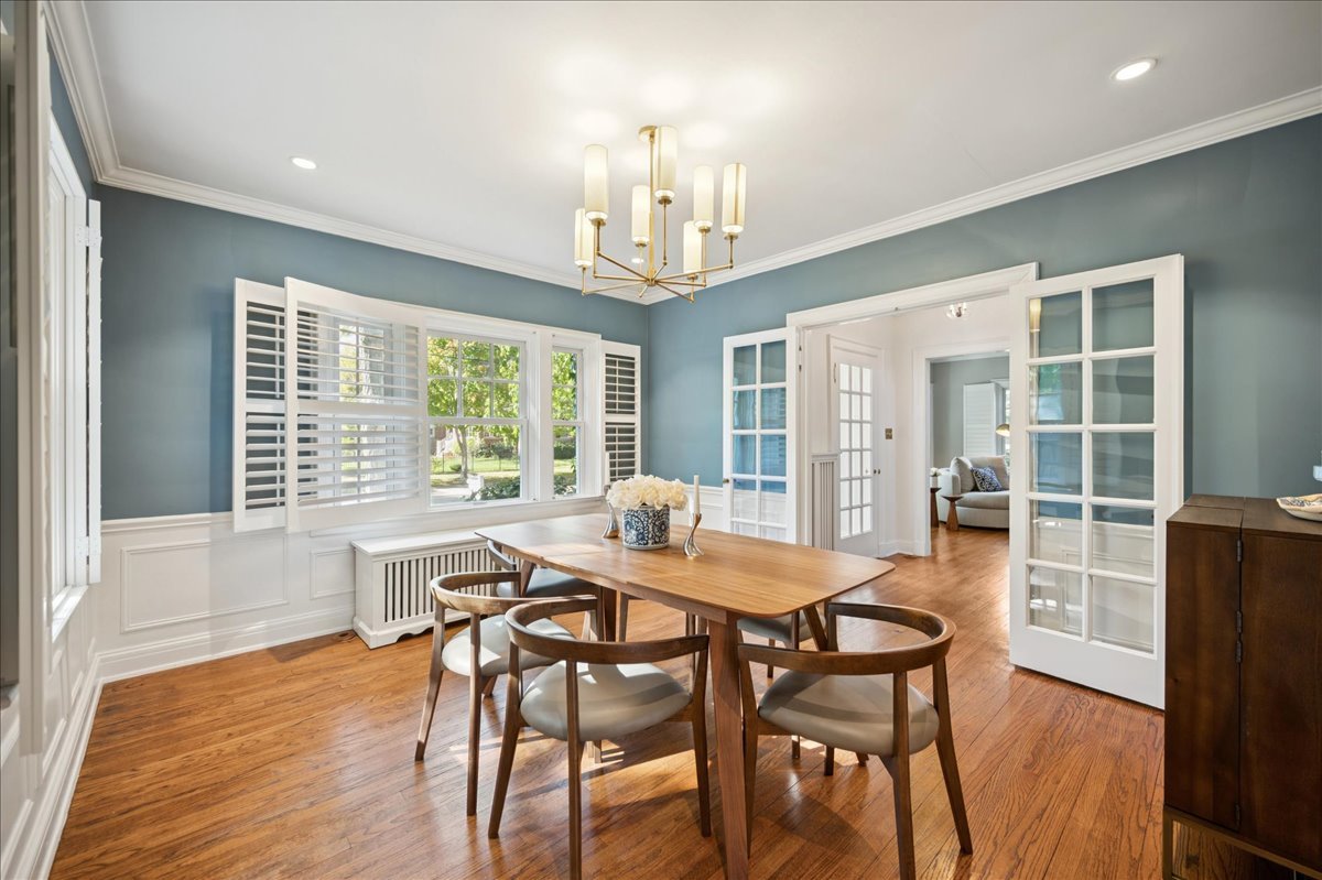 305 Poplar Street Winnetka, IL 60093 - Photo 14 of 26 a dining room with furniture window and wooden floor