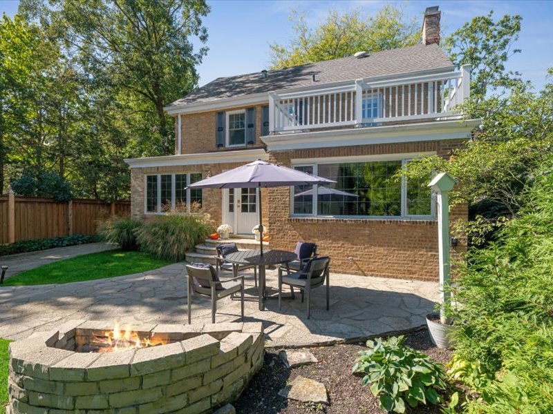 305 Poplar Street Winnetka, IL 60093 - Photo 26 of 26 a swimming pool with outdoor seating and yard