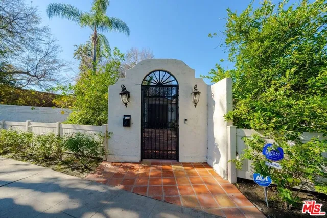 a view of hallway with natural light