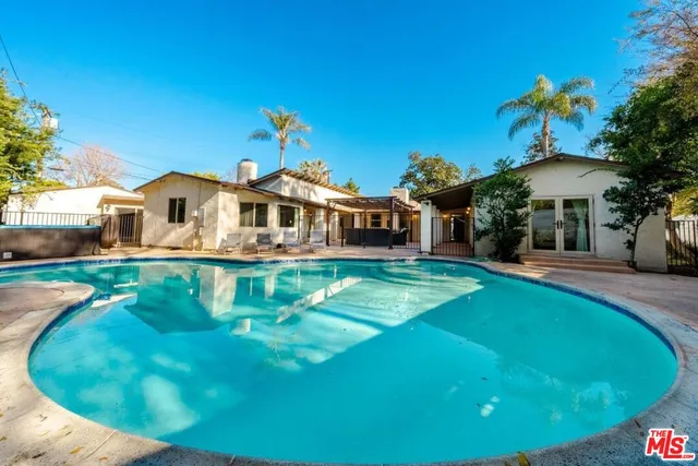 a kitchen with a stove and a cabinet