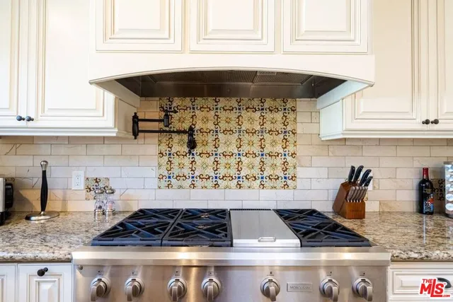 a view of a dining room with furniture and window