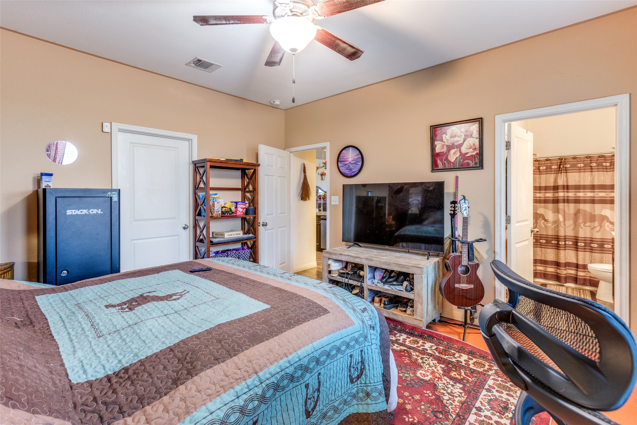 13909 Sherri Berry Way Manor, TX 78653 - Photo 11 of 28 Room featuring neutral-toned walls and wood-finish flooring