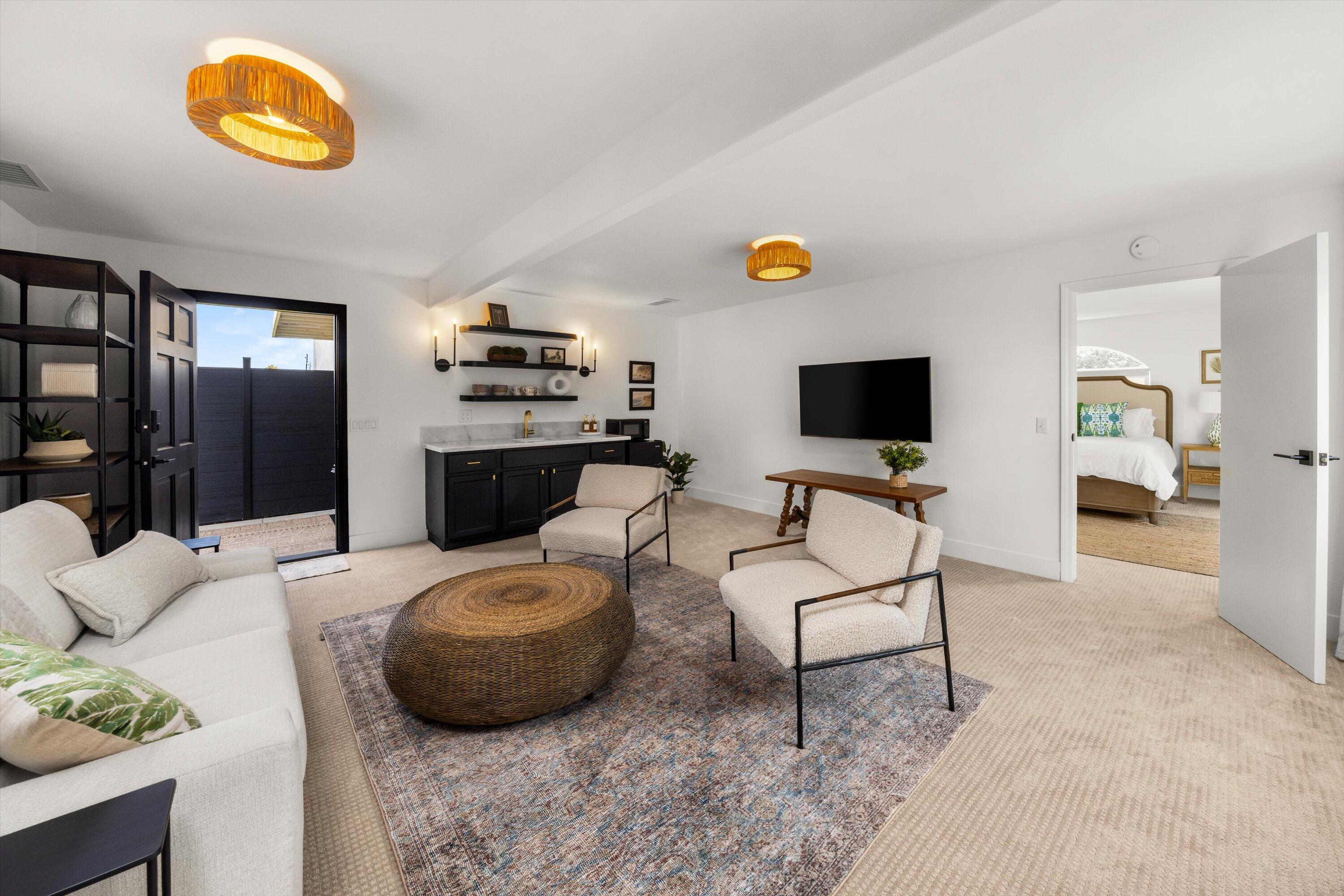 1378 Sycamore Canyon Road Santa Barbara, CA 93108 - Photo 18 of 28 a living room with furniture and a flat screen tv