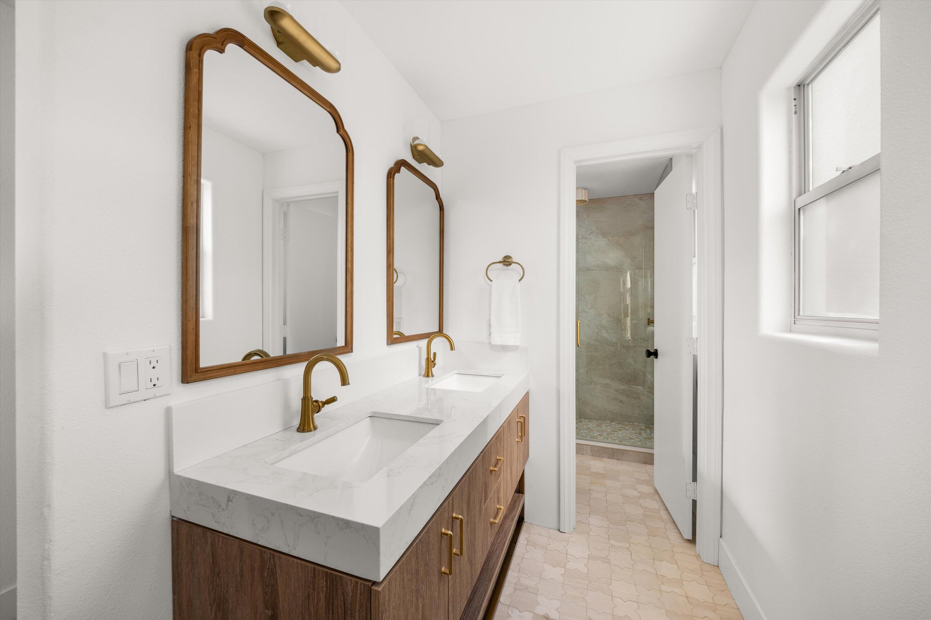 1378 Sycamore Canyon Road Santa Barbara, CA 93108 - Photo 20 of 28 a bathroom with a sink and a mirror