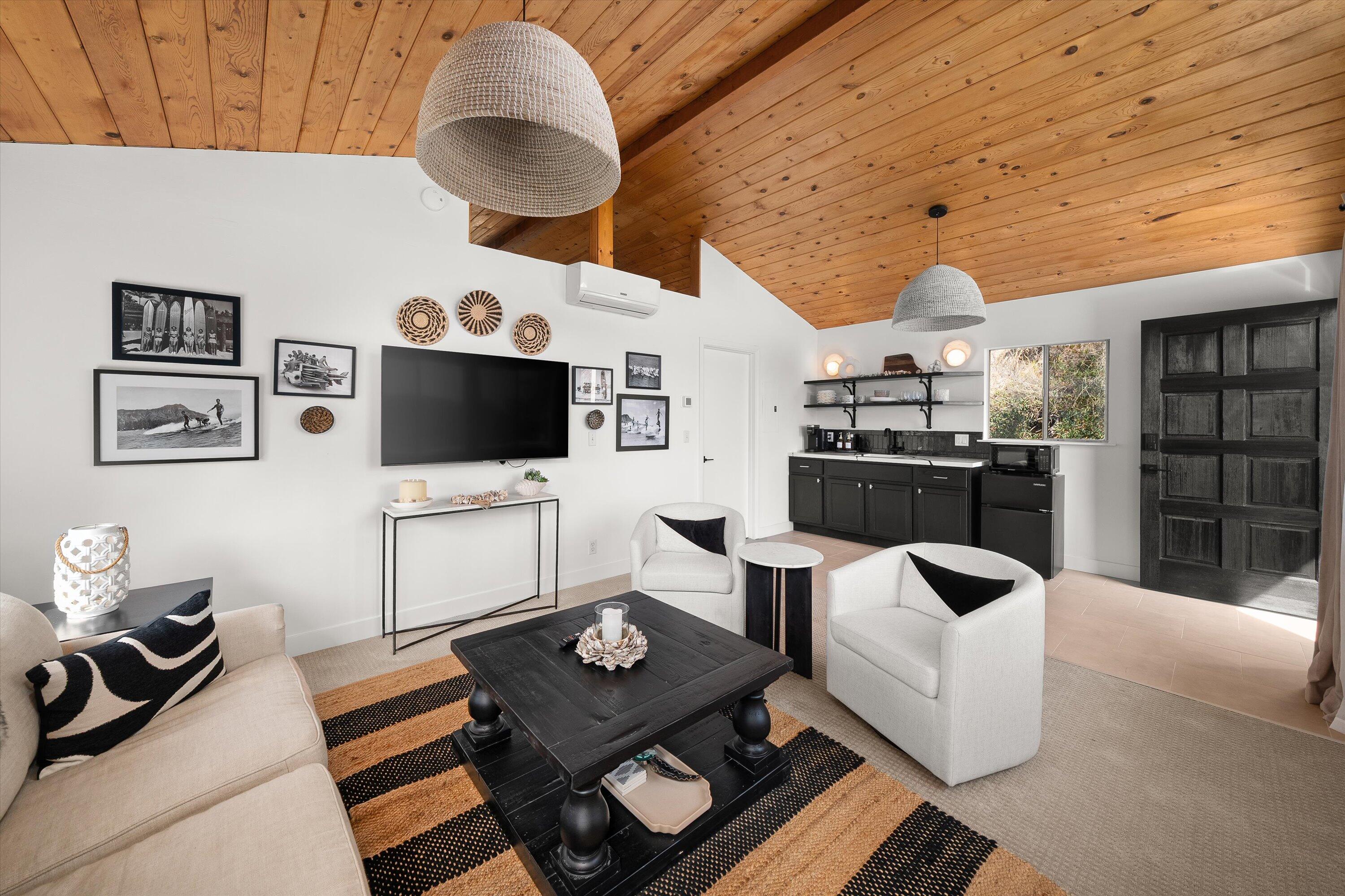 1378 Sycamore Canyon Road Santa Barbara, CA 93108 - Photo 22 of 28 a living room with furniture and a flat screen tv