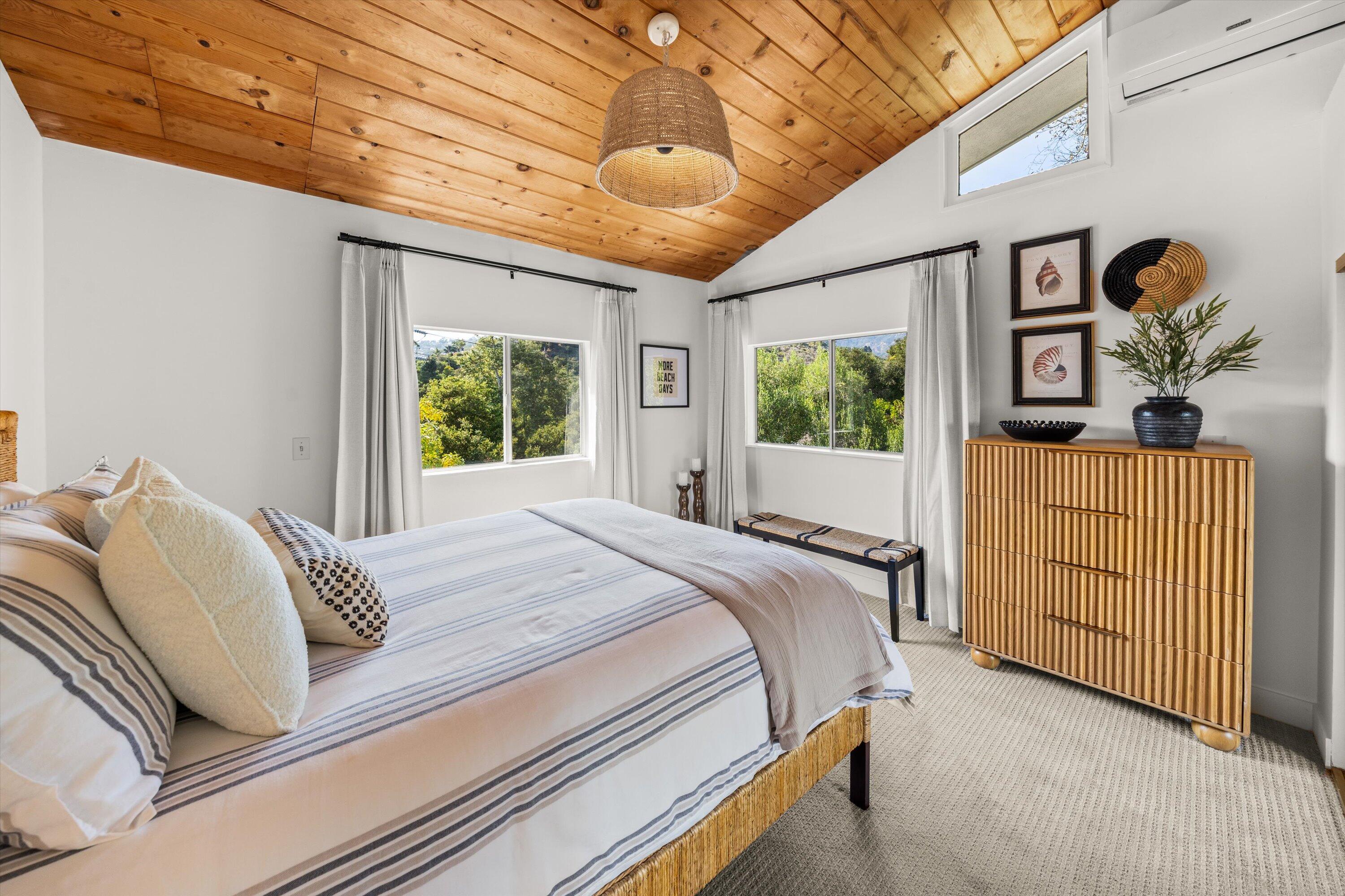 1378 Sycamore Canyon Road Santa Barbara, CA 93108 - Photo 24 of 28 a bedroom with a bed and window