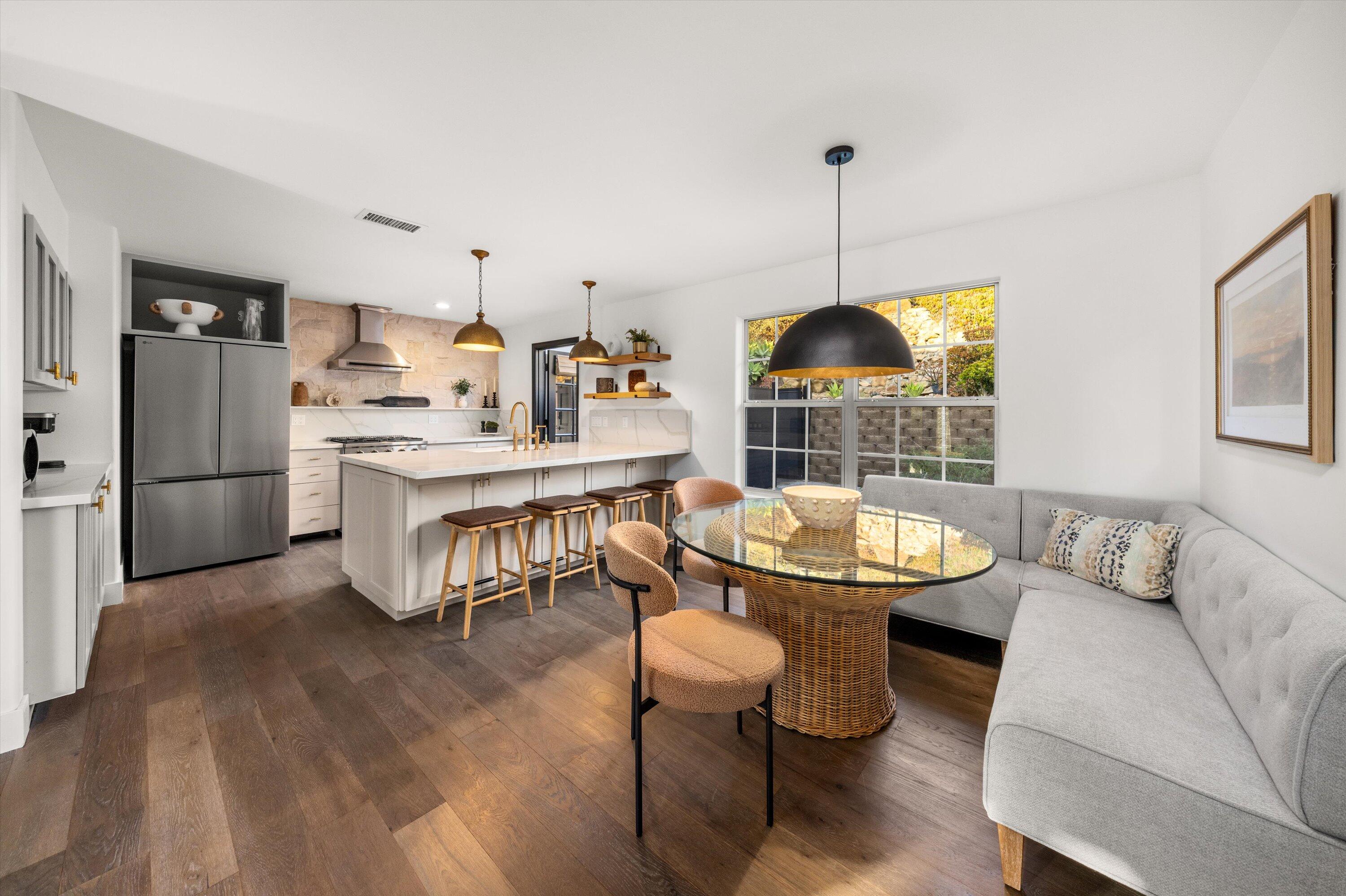 1378 Sycamore Canyon Road Santa Barbara, CA 93108 - Photo 5 of 28 a dining room with furniture and a window