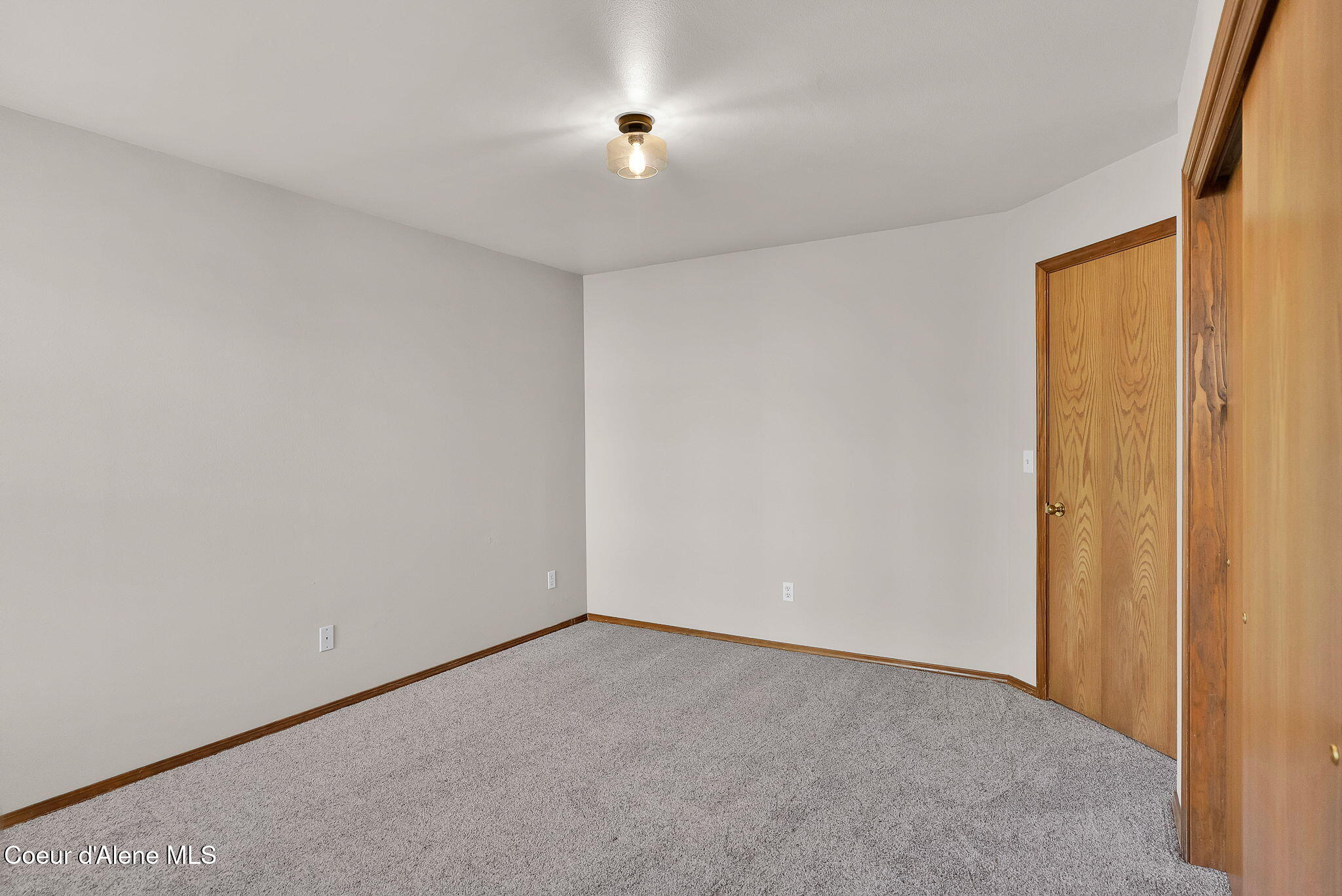 8233 North Ridgewood Drive, Unit 4 Hayden, ID 83835 - Photo 21 of 50 Primary Bedroom