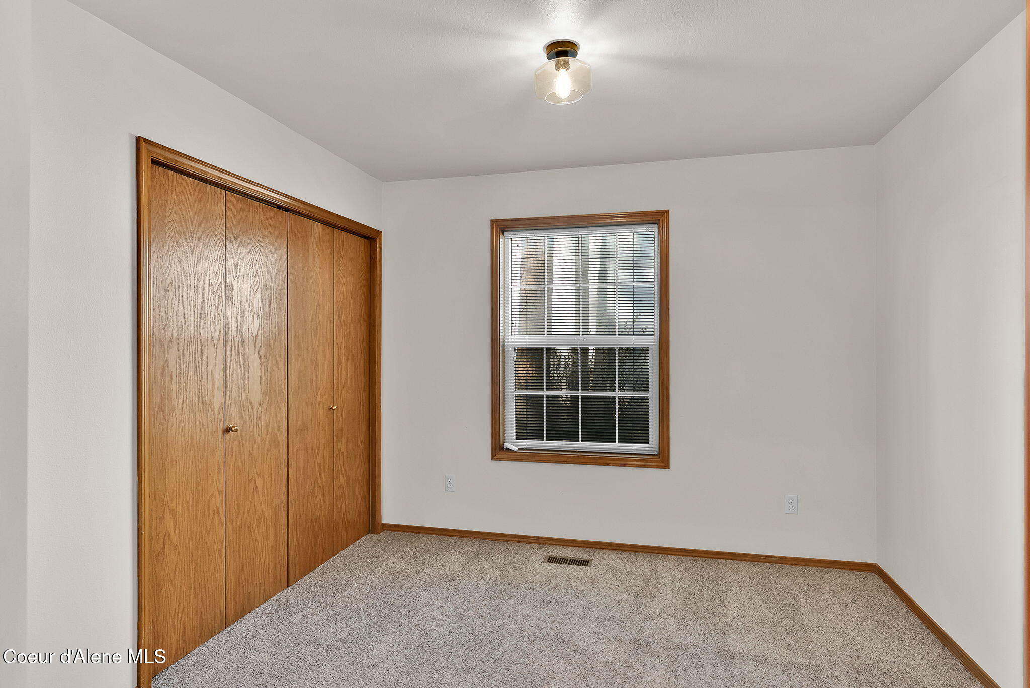 8233 North Ridgewood Drive, Unit 4 Hayden, ID 83835 - Photo 32 of 50 Bedroom 2