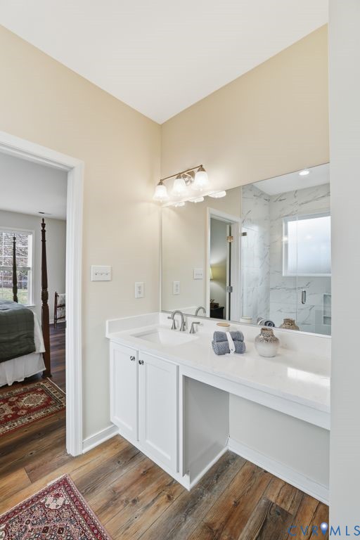 13924 Krim Point Road Midlothian, VA 23114 - Photo 22 of 48 a bathroom with a sink double vanity and a mirror
