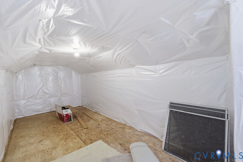13924 Krim Point Road Midlothian, VA 23114 - Photo 29 of 48 a view of a room with rack and wooden floor