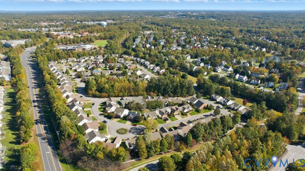 13924 Krim Point Road Midlothian, VA 23114 - Photo 36 of 48 an aerial view of a city with lots of residential buildings