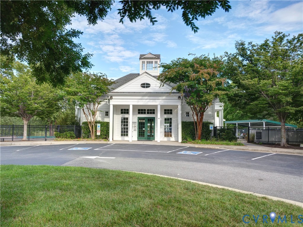 13924 Krim Point Road Midlothian, VA 23114 - Photo 41 of 48 a front view of a house with a garden