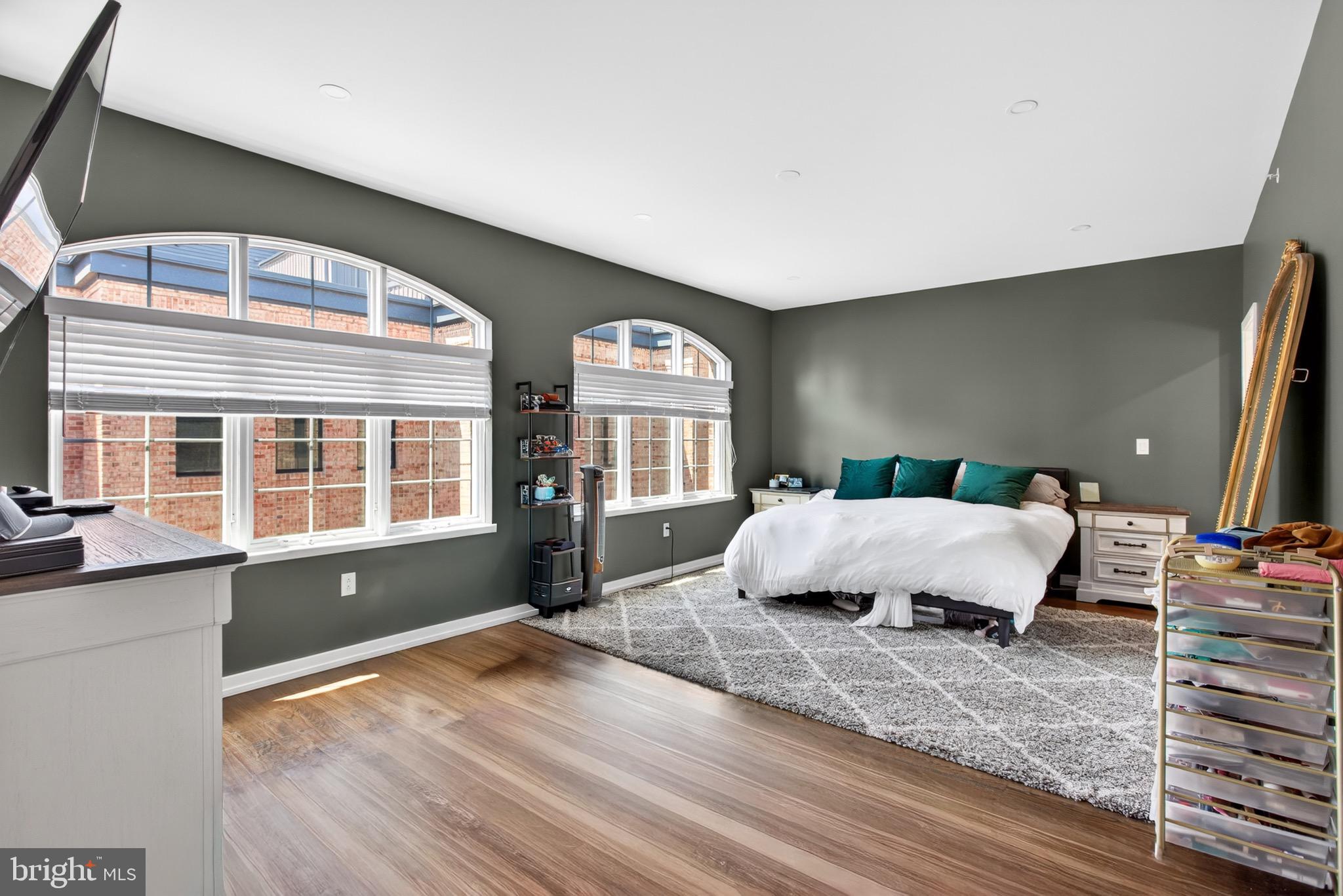 2411 Innovator Way Philadelphia, PA 19146 - Photo 17 of 26 a large bedroom with a large bed and a large window