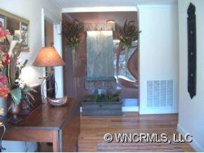 901 Hawk Ridge Drive Mill Spring, NC 28756 - Photo 2 of 12 an outdoor space with painting on the wall