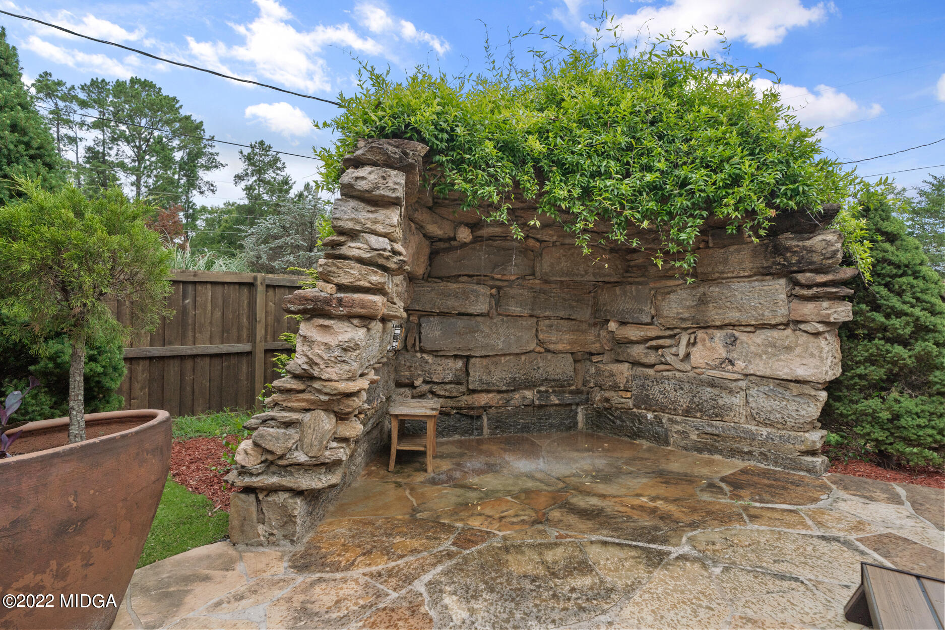 265 Blount Road Forsyth, GA 31029 - Photo 34 of 70 a backyard of a house with table and chairs