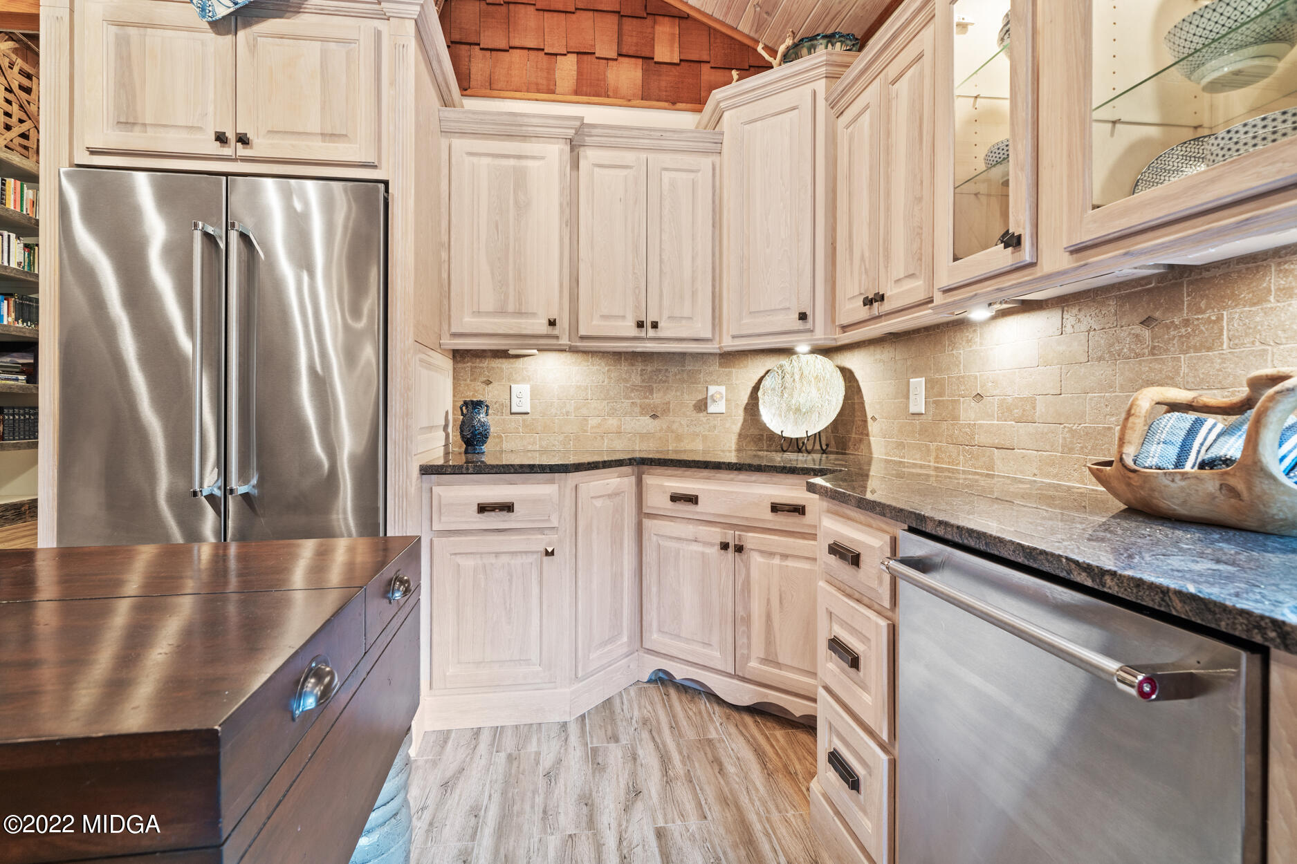265 Blount Road Forsyth, GA 31029 - Photo 56 of 70 a kitchen with stainless steel appliances granite countertop a refrigerator a sink and white cabinets