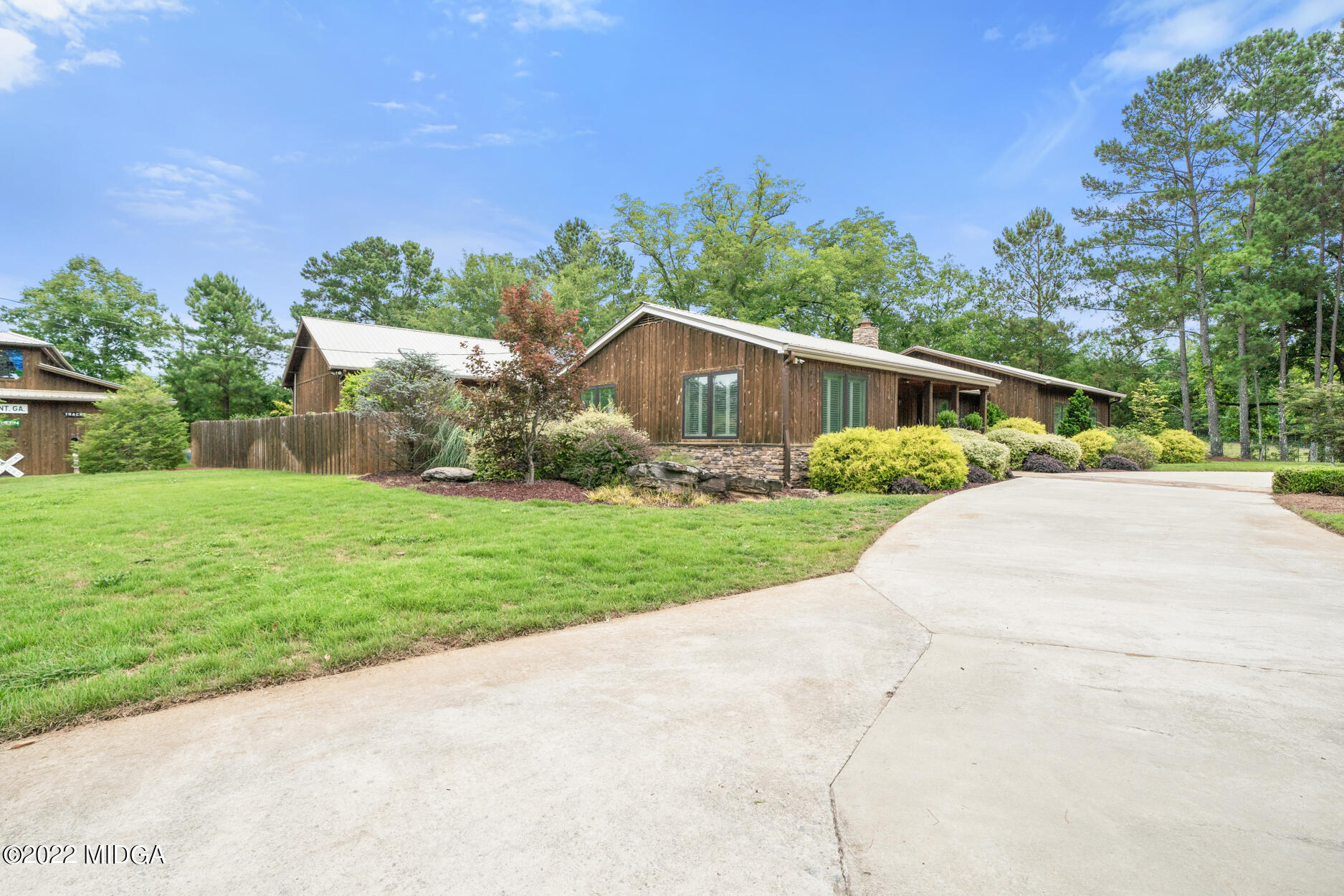 265 Blount Road Forsyth, GA 31029 - Photo 6 of 70 a front view of house with yard and green space