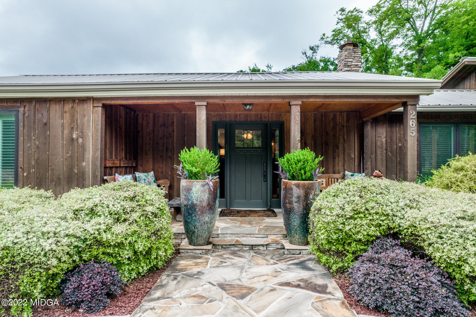 265 Blount Road Forsyth, GA 31029 - Photo 8 of 70 a front view of a house with plants