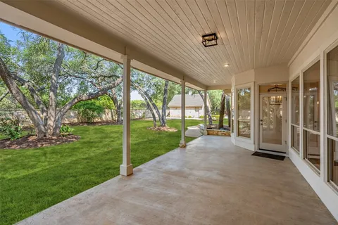 a view of a porch with garden